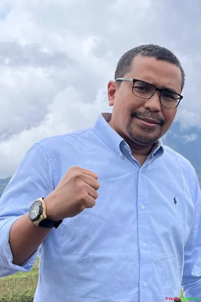 Dr. Charles Simabura, SH., MH.