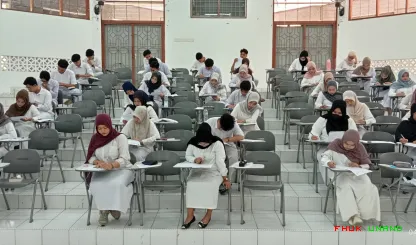 Foto 2 UTS semester genap tahun ajaran 2025/2026 di gedung...
