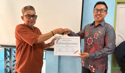 Foto 9 Kegiatan Pengabdian kepada Masyarakat bertajuk...