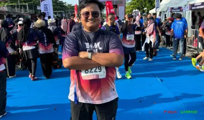 Foto 5 Kedua tenaga kependidikan FH Unand tersebut adalah...