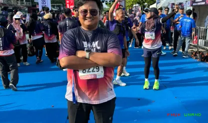 Foto 12 Kedua tenaga kependidikan FH Unand tersebut adalah...