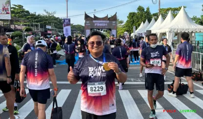 Foto 14 Kedua tenaga kependidikan FH Unand tersebut adalah...